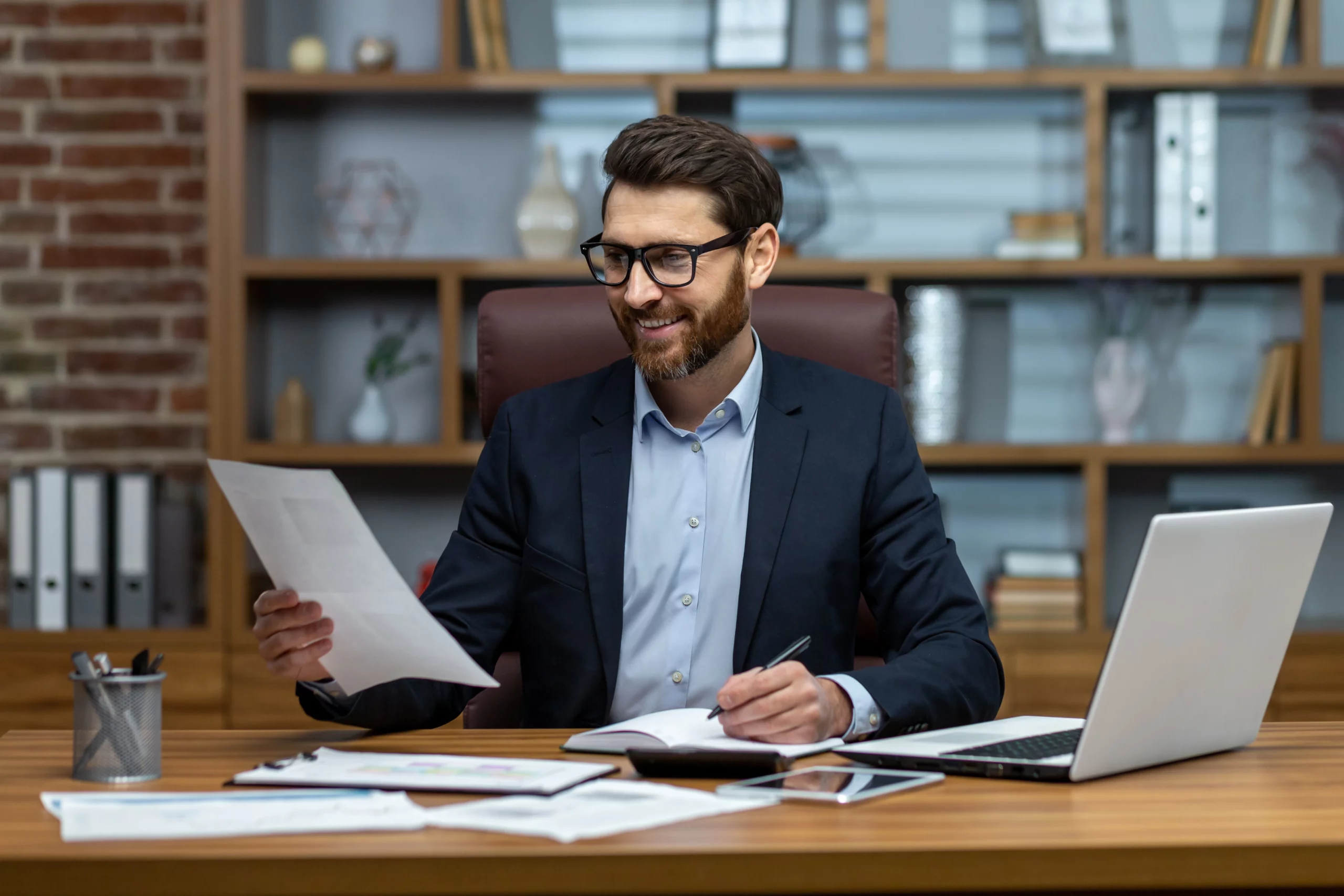 Professional in Florida office preparing paperwork to start an LLC